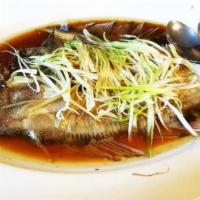 7. Steamed Live Fish with Ginger and Scallions · 
