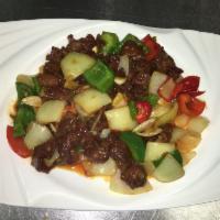 F6. Quick Fried Shredded Lamb with Pepper, Celery and Onion 羊肉小炒 · Spicy.