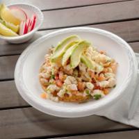 Fish Ceviche Tostada · Fish Ceviche Tostada marinated in lime juice and our special blend of spices. Garnished with...