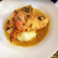 Chicken Piccata · Mash potatoes & Roasted tomatoes in Chicken Jus