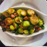 Fried Brussel Sprouts With Slab Bacon · Capers, Parmesan Cheese & Garlic Dressing