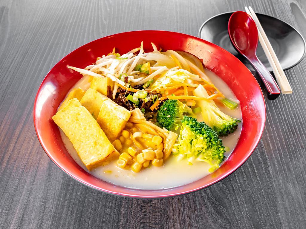 Vegetables Miso Ramen · Ramen noodle cooked in a vegetable miso broth. Served with seasoned egg, sprouts, green onion, sweet corn and seaweed.