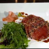 Seared Black Pepper Tuna  · Seaweed salad, seared black pepper tuna with wasabi yuzu sauce.