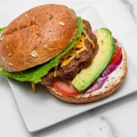 Black Bean Burger Meal · With rice and peas, steamed vegetables. Vegan.