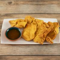 9. Crab Rangoon · 8 pieces. Fried wonton wrapper filled with crab and cream cheese.