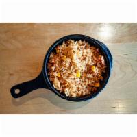 Spanish Rice · Slow simmered in tomato and spices
