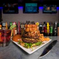 Pork Rodeo Burger · Hamburger, pulled pork, pepper jack cheese, frizzled onions, lettuce, tomato, smokey BBQ sau...