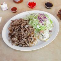 Kalua Pork Special · Served with rice, cabbage chicken salad, and potato-macaroni salad.