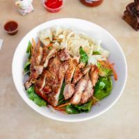 Island Chicken Salad · Marinated Chicken, fried wontons, beansprouts, carrots, lettuce, and our delicious house dre...