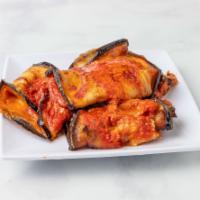 INVOLTINI DI PARMIGIANA · Sliced Eggplant, Fresh Mozzarella, Parmigiano
Reggiano and Signature Tomato Sauce