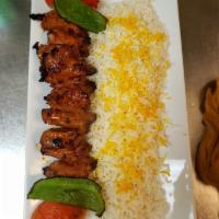 Lamb Shish Kebab · Marinated cubes of Lamb, grilled on skewers.
Served with basmati rice, grilled tomatoes and ...