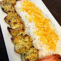 Chicken - Jojeh Kabab · Marinated tender chunks of chicken, grilled on skewers.
Served with basmati rice, cucumber y...