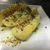 Lemon Potatoes · Golden Oven baked lemon potatoes drizzled with lemon