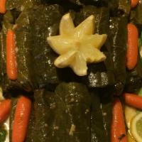 Sm Vegetarian Grape Leaves · Grape leaves staffed with mixture of vegetables and rice .