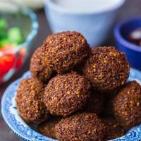 Falafel (6pcs) · Chickpeas, onions, garlic, herbs and spices deep fried served with tahini sauce.