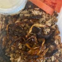 Mujadra with Rice Appetizer · Cooked lentils with sautéed onions and rice served with yogurt.
