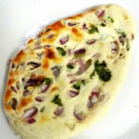 Onion Kulcha · A fluffy white bread stuffed with onions and bell peppers