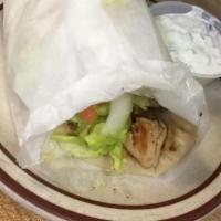 Grilled Chicken Wrap · Marinated chicken tenderloins grilled and chopped in a toasted pita with our own tzatziki sa...