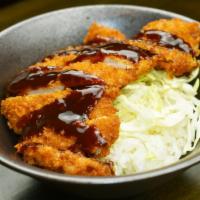 Chicken Katsu · Japanese breaded and fried chicken cutlet over rice with tonkatsu sauce.