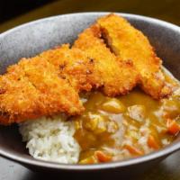 Curry Chicken Katsu · Japanese breaded and fried chicken cutlet over rice with curry sauce.