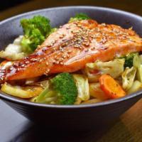 Salmon Teriyaki · Grilled salmon, stir-fry vegetables, rice, and teriyaki sauce.