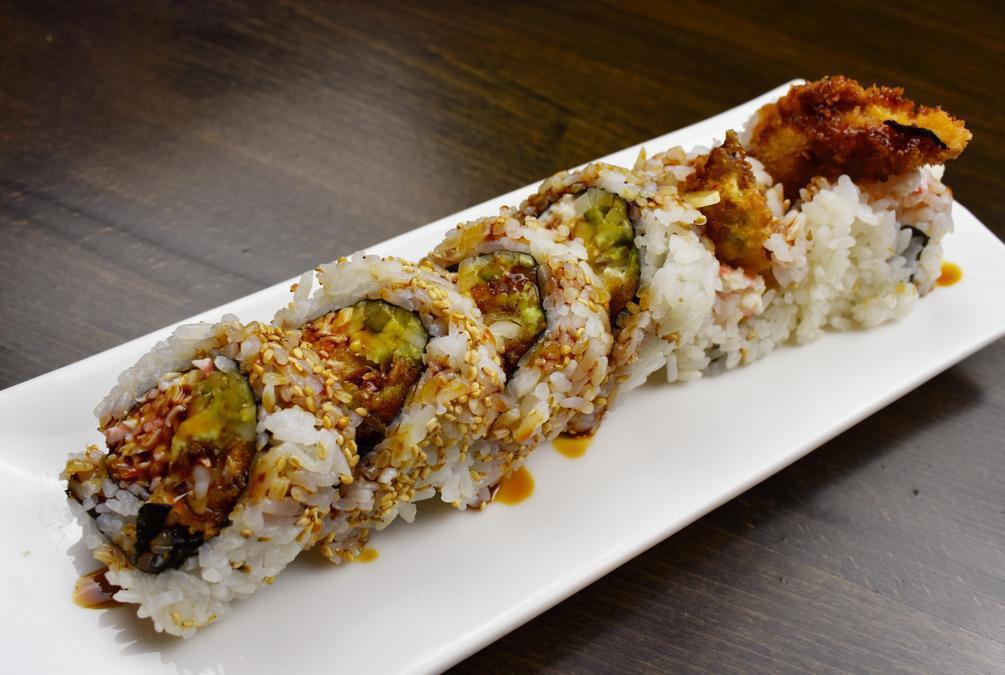 Spider Roll · Cucumber, avocado, and fried soft shell crab with eel sauce.