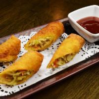 Egg Rolls Small Plate · 2 pieces. Deep fried pork and vegetables rolled egg roll wrapper.