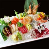 Sashimi Omakase 8 Special · 24 pieces sashimi. Chef’s choice of 8 kinds of sashimi . Served with miso soup and salad.