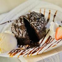 Chocolate Lava  · Served warm with whipped cream and a scoop of vanilla ice cream.