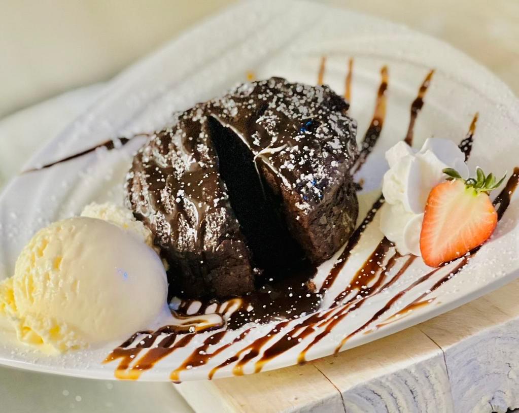 Chocolate Lava  · Served warm with whipped cream and a scoop of vanilla ice cream.