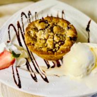 Cookie Lava · Served warm with whipped cream and a scoop of vanilla ice cream.