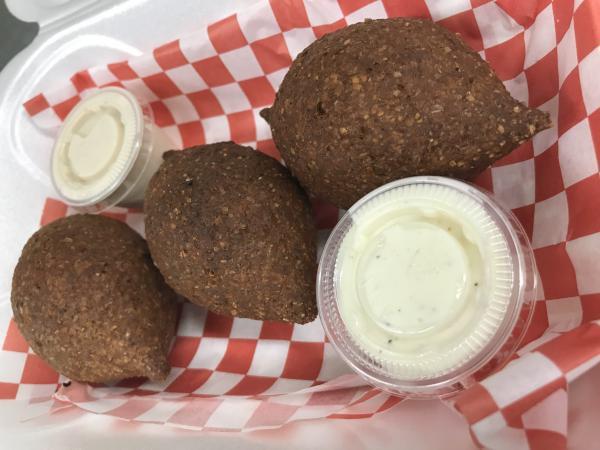 3 Pieces Kibbeh Frito · Selected seasoned fine meat ground with wheat stuffed with sauteed onions and ground beef.