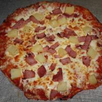 Hawaiian Specialty Pizza · Dave's homemade pizza crust topped with mozzarella cheese, ham, and pineapple. 12 inch round...