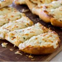 Small Garlic Bread with Cheese · 8 inch qarlic bread with melted mozzarella cheese