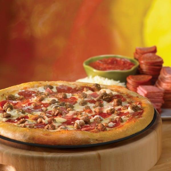 The Meatster Pizza · Our secret recipe pizza sauce topped with pepperoni, Italian sausage, ground beef, Italian salami, ham, bacon and topped with an extra amount of our special blend of 100% fresh natural cheeses.