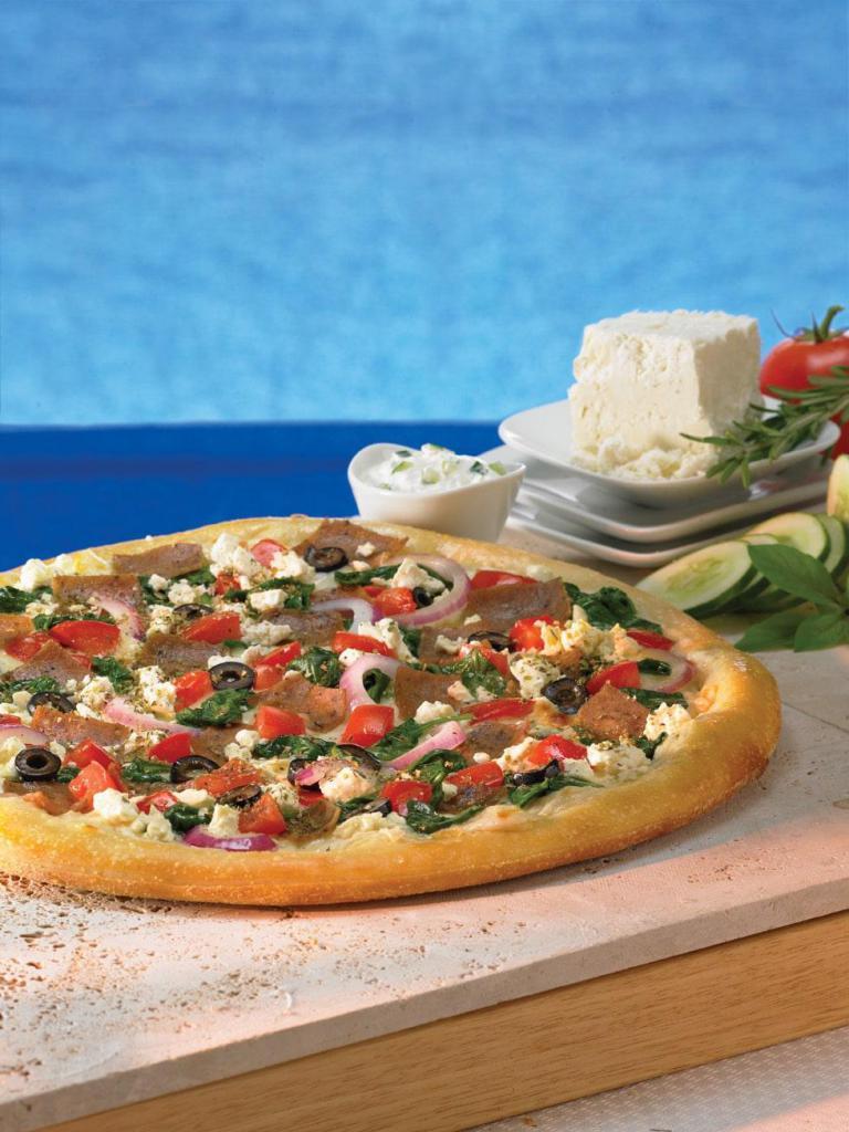 Greek Pizza · Tzatziki sauce topped with gyro meat, spinach, red onions, fresh tomatoes, black olives, feta cheese and special blend of 100% fresh natural cheeses.