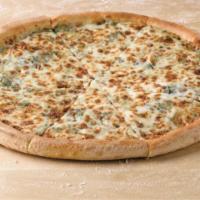 Spinach Alfredo Pizza · Rich and creamy Alfredo sauce blended with spinach and topped with mozzarella cheese!