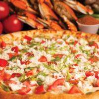 Crab Pizza · Alfredo sauce, crab meat, tomatoes, onion and extra cheese.