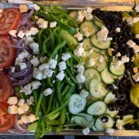 Greek salad tray  · Romaine lettuce, Green peppers, Red onion, Tomato, Cucumbers, Black olives and Feta cheese 