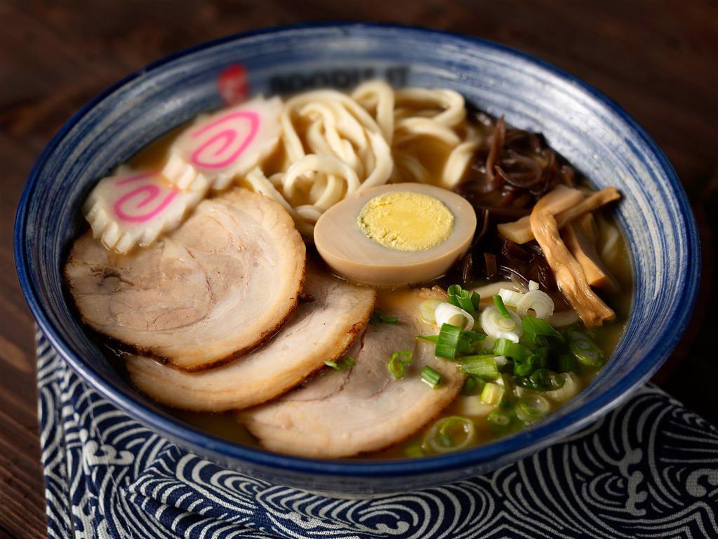 Japanese Style Miso Noodle · Cha-shu pork served with bamboo shoots, dried seaweed, black mushrooms, fish cake, egg and green onions in a miso soup.