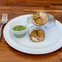 Seekh Kabab Wrap · Lamb seekh kabab, lettuce, tomato, cucumber and variety of sauces wrapped in naan bread.
