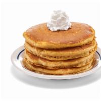 Pumpkin Spice Pancakes - (Full Stack) · Four pumpkin pancakes made with real pumpkin and seasonal spices, crowned with creamy whippe...