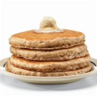 Harvest Grain ’N Nut® Pancakes · Go nuts for four fluffy pancakes filled with wholesome oats, almonds & walnuts and topped wi...