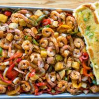 World Famous Shrimp Tray · For 4 people. Grilled shrimp, sliced bell peppers, onions, tomatoes, and potatoes in our sig...