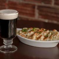 Shepherd's Pie · Ground beef slow cooked with peas, carrots, mushrooms, and onions, in brown gravy topped wit...