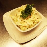 Pub Slaw · Cabbage, onions and carrots julienned and tossed with our own house slaw dressing