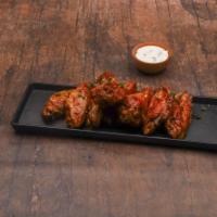 Buffalo Wings · Mild, hot, or BBQ. Served with blue cheese.