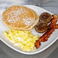 2 by 4 Starwood Favorite · 2 buttermilk pancakes, 2 eggs any style with 2 strips of bacon, and 2 sausage patties.