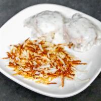 Biscuits and  Gravy · Sausage gravy ladled over flakey biscuits. Served with hash browns.