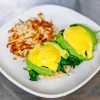 Starwood Benedict · Two poached eggs on a toasted English muffin, avocado, spinach, grilled tomatoes topped with...